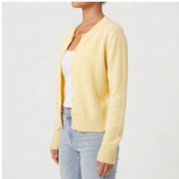 Model wearing S knit cardigan in a studio - 4