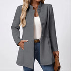 Model wearing Gray jacket in a studio