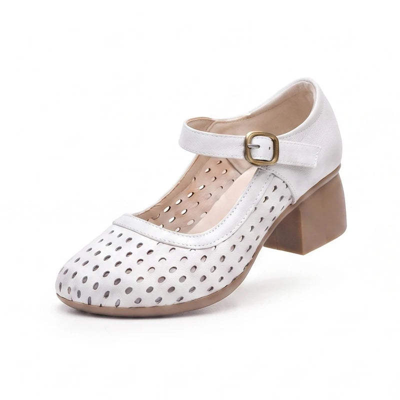 Black leather heels on a white background