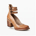 Light Brown leather boots on a white background