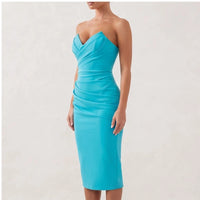 Model wearing Turqoise dress in a studio - 2