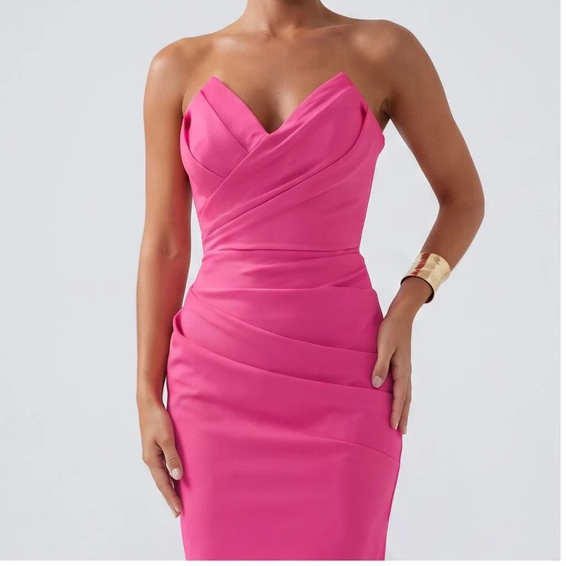 Model wearing Rose dress in a studio