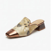 Khaki mules on a white background