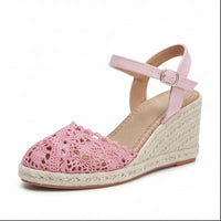 Pink sandals on a white background