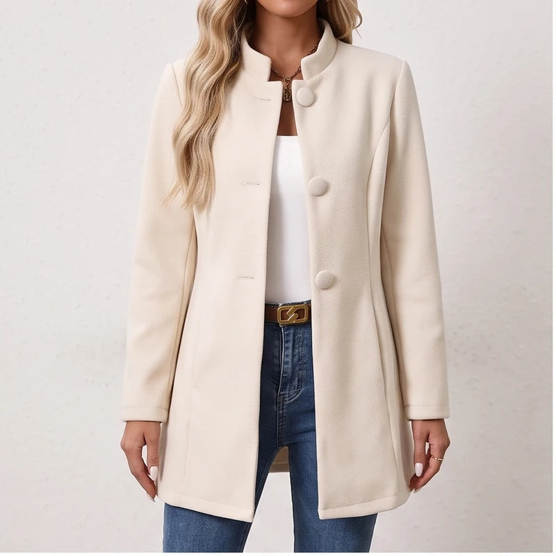 Model wearing Apricot jacket in a studio