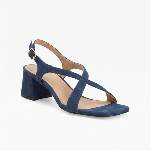 Blue suede sandals on a white background