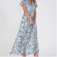 Model wearing Light Blue chiffon dress in a studio