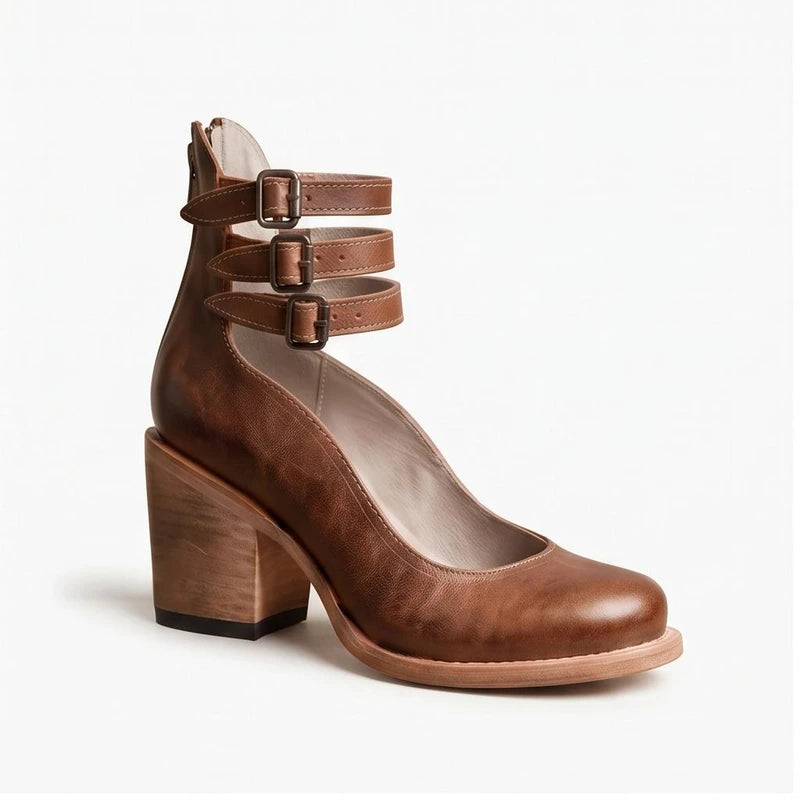 Brown leather boots on a white background