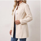 Model wearing Apricot jacket in a studio - 2