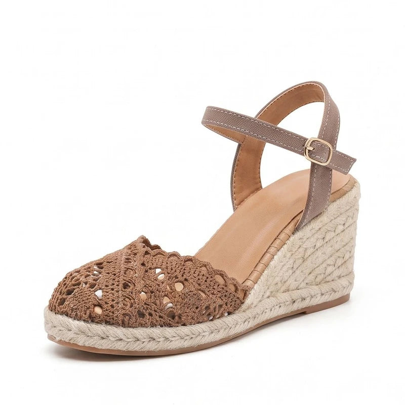Brown sandals on a white background