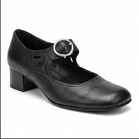 Black leather pumps on a white background