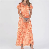 Model wearing Orange chiffon dress in a studio - 2