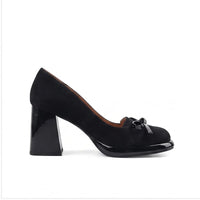 Black suede heel on a white background - 2