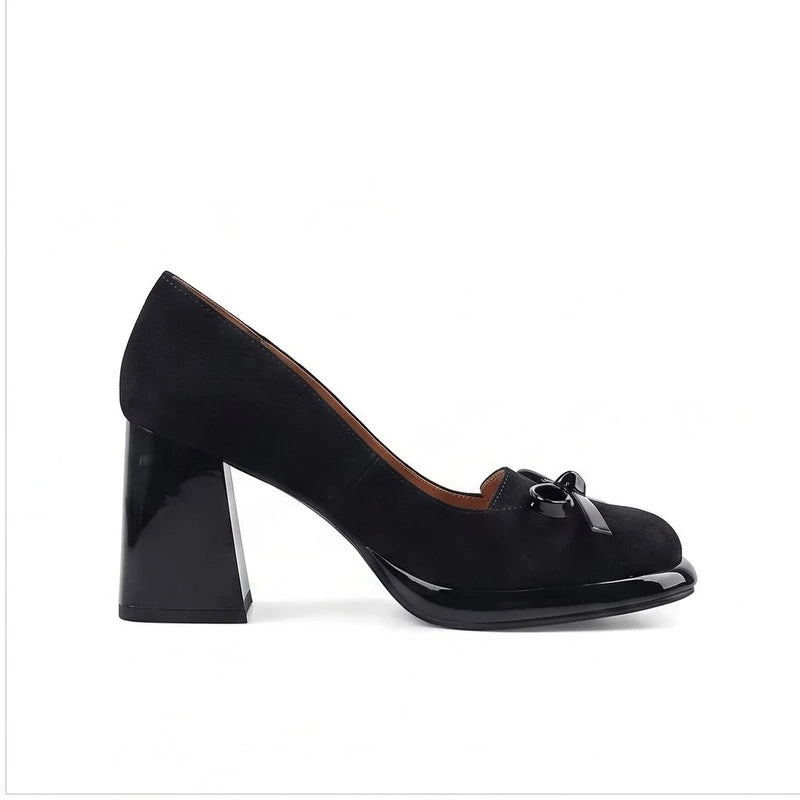 Black suede heel on a white background - 2