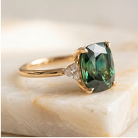 Model wearing 6 Vivienne Green Zirconia Gold Ring close-up - 2