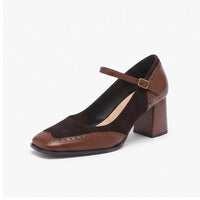 Brown heels on a white background
