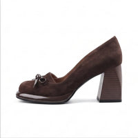 Brown suede heel on a white background - 2