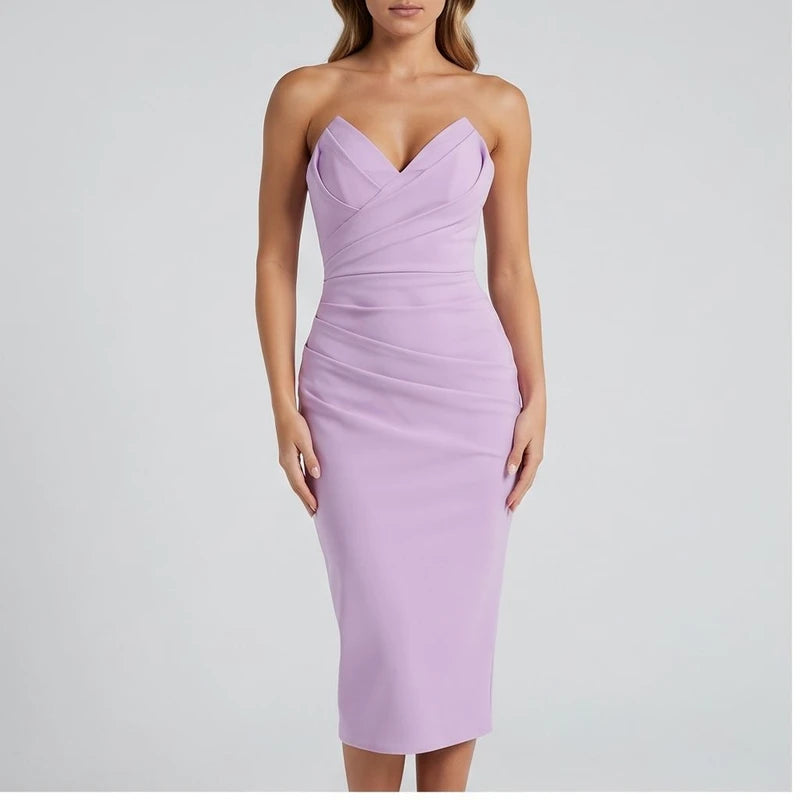 Model wearing Pink dress in a studio