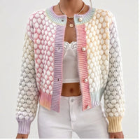 Model wearing S knit cardigan in a studio