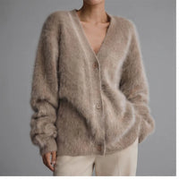 Model wearing Brown cashmere cardigan in a studio