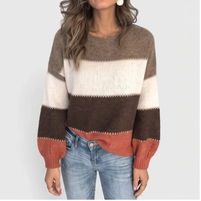 Model wearing Orange pullover in a studio
