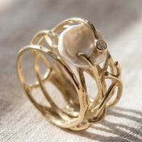Model wearing 6 Samira - Thin Golden & Pearl Ring close-up - 2