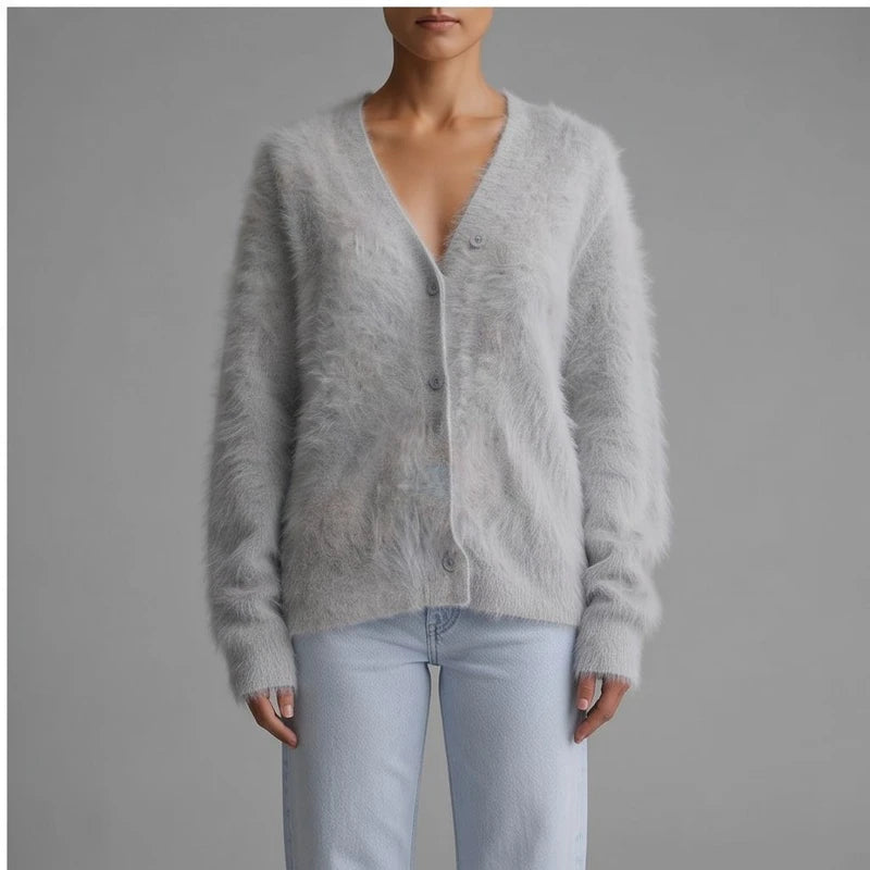 Model wearing Light Gray cashmere cardigan in a studio - 2