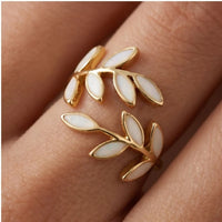 Model wearing Adjustable Pure - White Opal Leaf Adjustable Ring close-up - 4