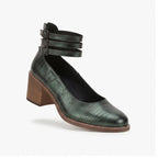 Green pumps on a white background