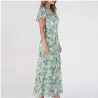 Model wearing Green chiffon dress in a studio - 2