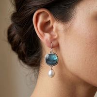 Model wearing Larimar Pearl Drop Blue Stone Earrings Larimar Pearl Drop Blue Stone Earrings close-up - 3