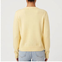 Model wearing S knit cardigan in a studio - 2