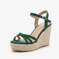 Green sandals on a white background