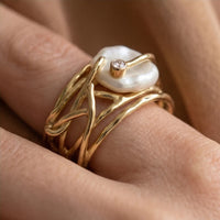 Model wearing 6 Samira - Thin Golden & Pearl Ring close-up - 4