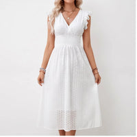 Model wearing White dress in a studio