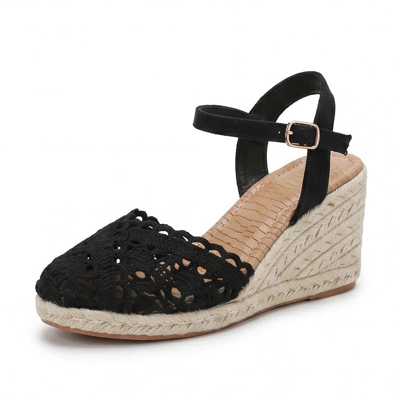 Black sandals on a white background
