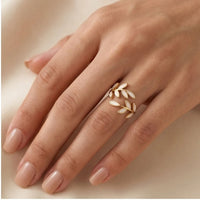 Model wearing Adjustable Pure - White Opal Leaf Adjustable Ring close-up - 2