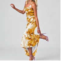 Model wearing Gold dress in a studio