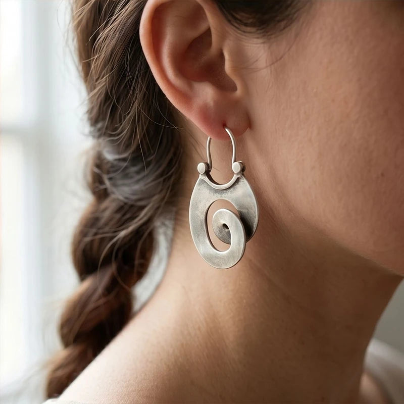 Model wearing Vintage Silver Spiral Earrings Vintage Silver Spiral Earrings close-up - 4