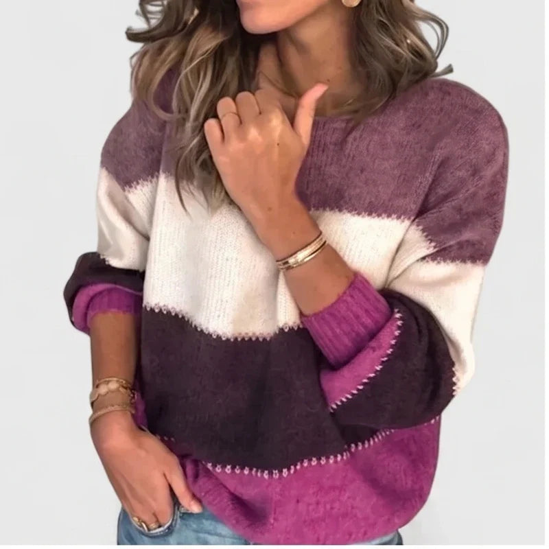 Model wearing Purple pullover in a studio