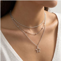Model wearing Celestial Vintage Star Pendant Necklace Celestial Vintage Star Pendant Necklace close-up - 3