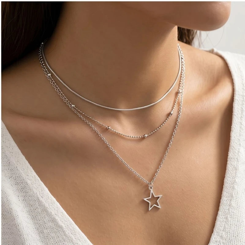 Model wearing Celestial Vintage Star Pendant Necklace Celestial Vintage Star Pendant Necklace close-up - 3