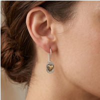 Model wearing Celeste Sterling Silver Heart Earrings Celeste Sterling Silver Heart Earrings close-up - 2