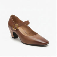 Brown leather heels on a white background