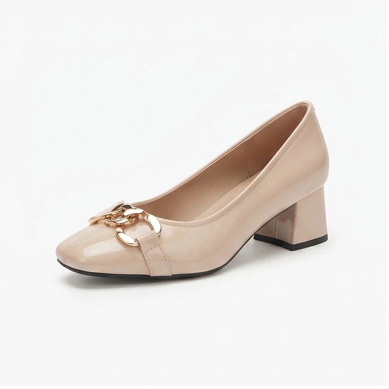 Apricot leather pump on a white background