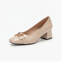 Apricot leather pump on a white background