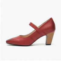 Red leather heels on a white background - 2