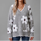 Model wearing Gray knit sweater in a studio