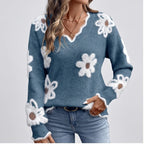 Model wearing Ocean Blue knit sweater in a studio