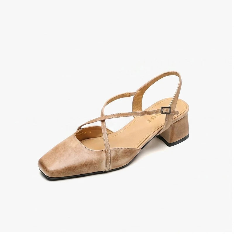 apricot leather sandals on a white background
